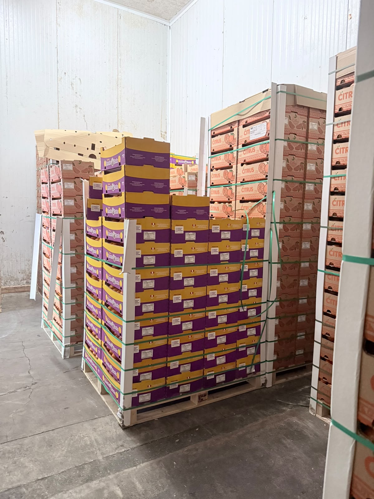 Packed fruit pallets ready for pickup